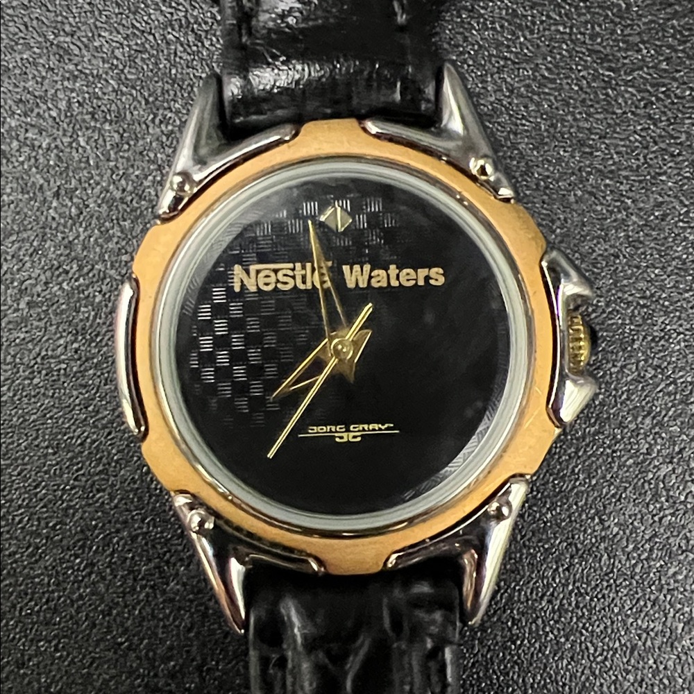 Nestle Waters Black and Gold Analog Ladies 8” Wristwatch by Jorg Gray JG